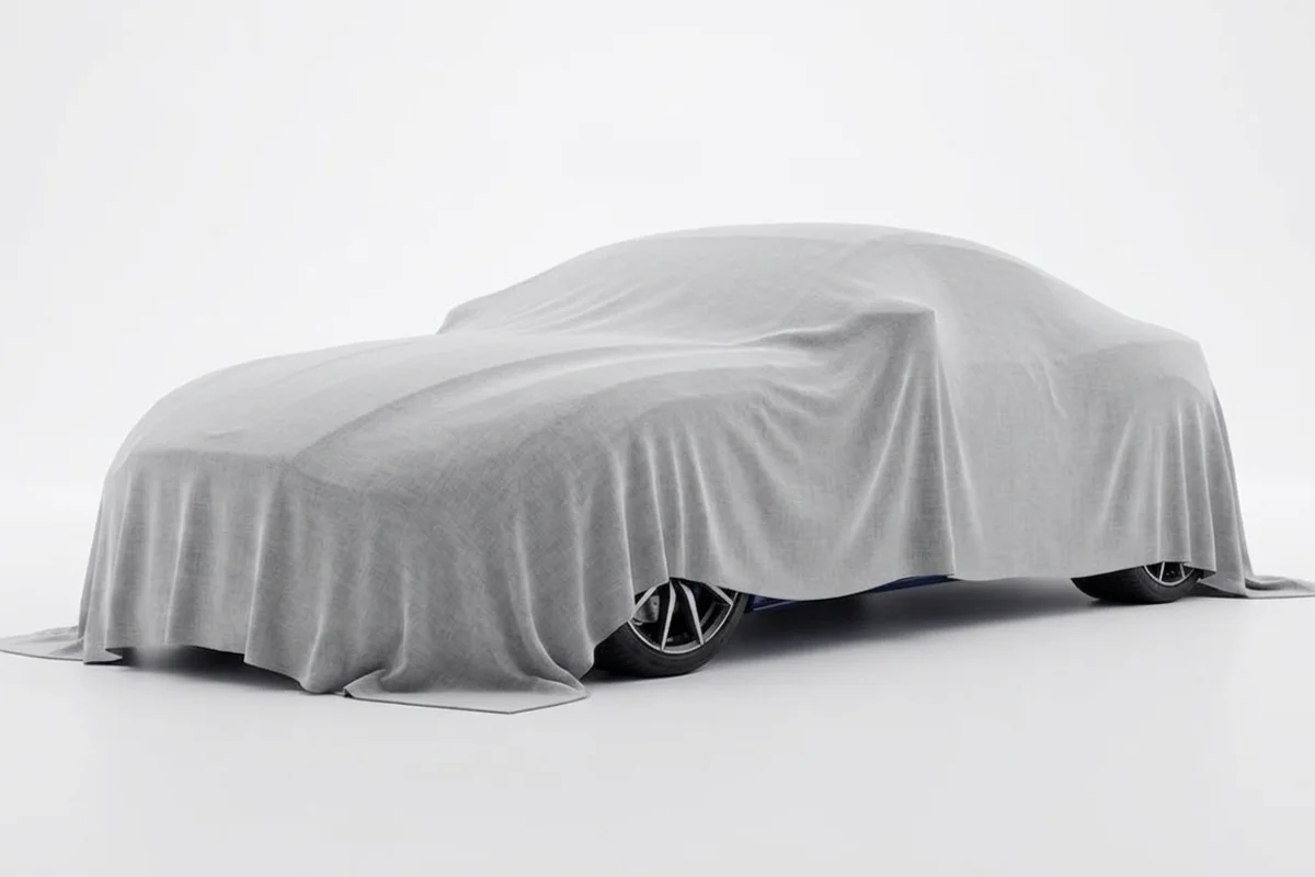 No photograph published — a car under a plain cover